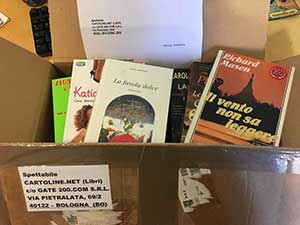 Pacco aperto contenente Libri usati in buono stato donati a Cartoline.net