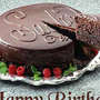 Happy birthday con torta al cioccolato